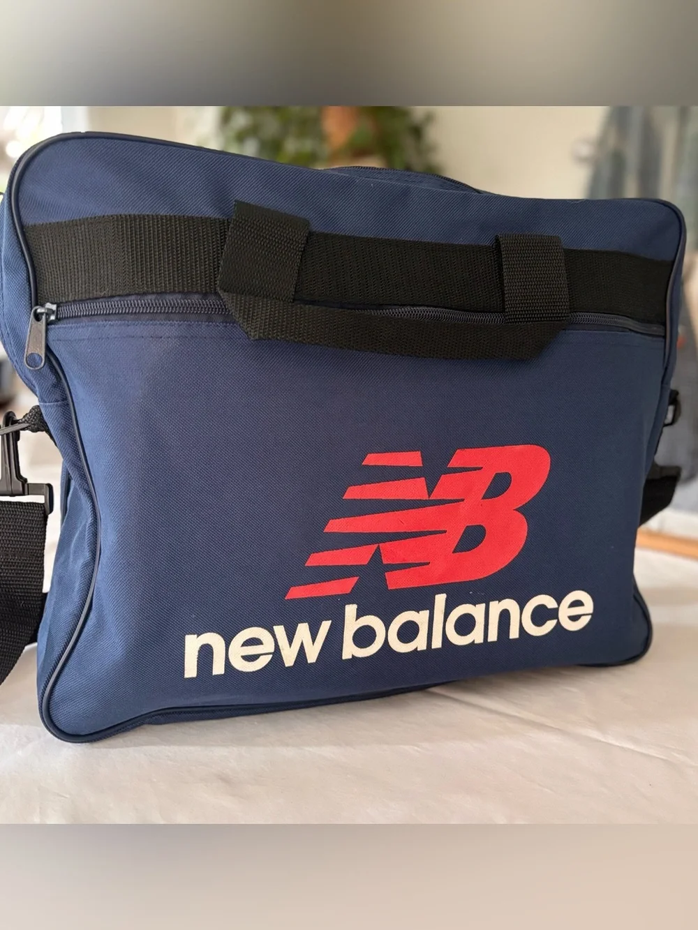 New Balance Navy Duffel Bag with Red Logo and White Branding